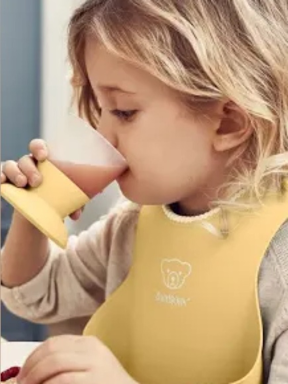 BabyBjorn Soft Bib yellow Deep Spill Pocket BPA Free Adjustable Neckband NIP